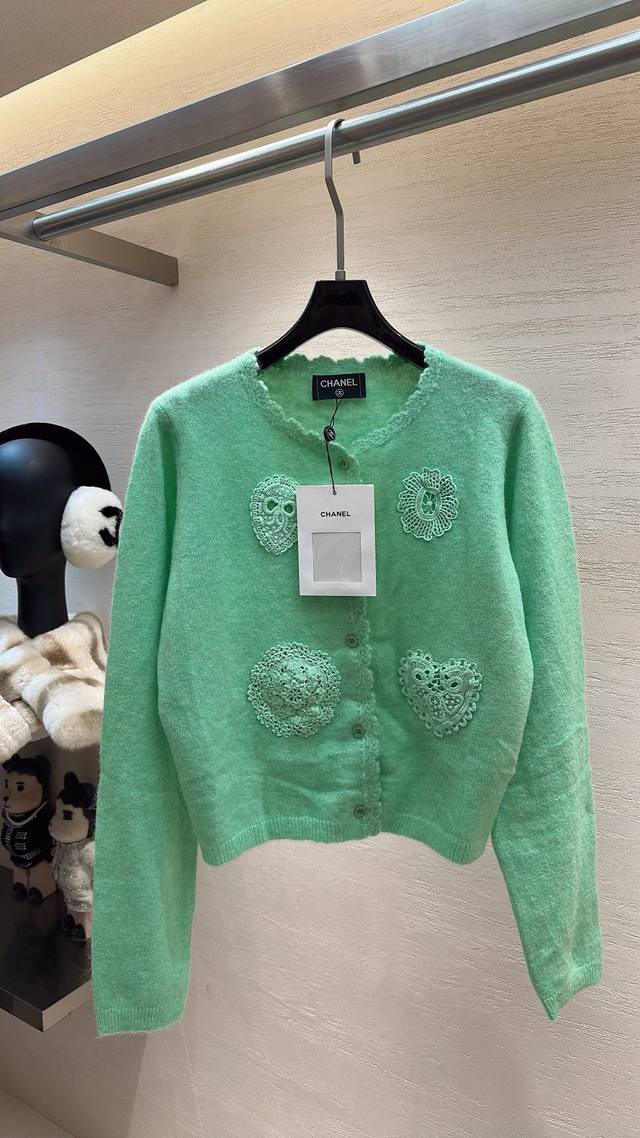 Chanel's stunning early spring collection! Mint green knitwear with delicate cro