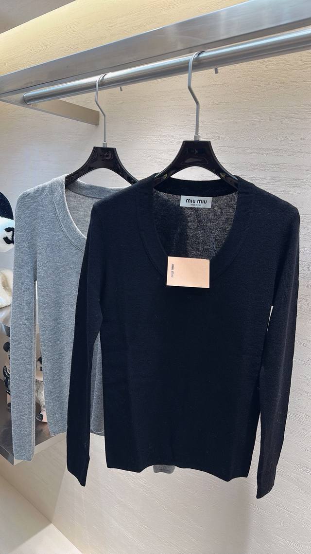 Miu Miu This Merino wool base layer is a gentle yet sophisticated piece for autu