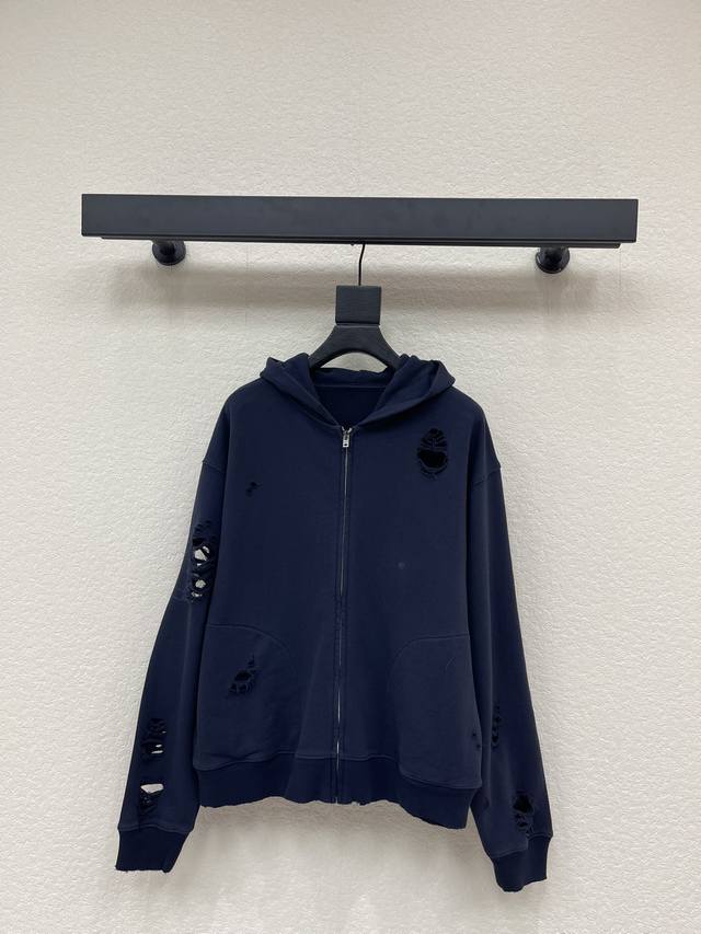 Acne distressed print jacket. The navy blue base makes the vintage stamp print l