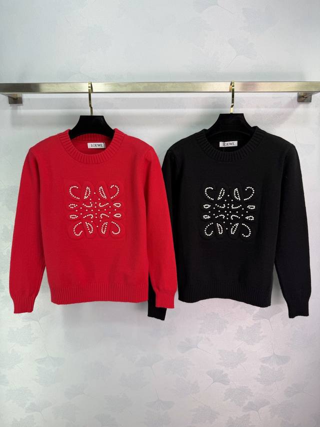 Loe*25 Autumn/Winter New Beaded Wool Sweater. The round neck design is simple an