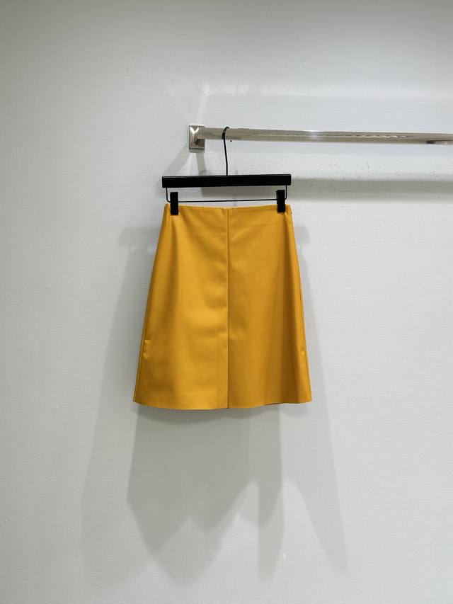 26Ss Early Spring New Arrival! This yellow glossy satin midi skirt has a smooth,