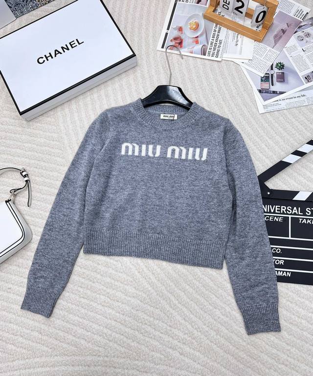 Miumiu American Preppy Style Letter Knit Sweater. This sweater exudes a retro Am