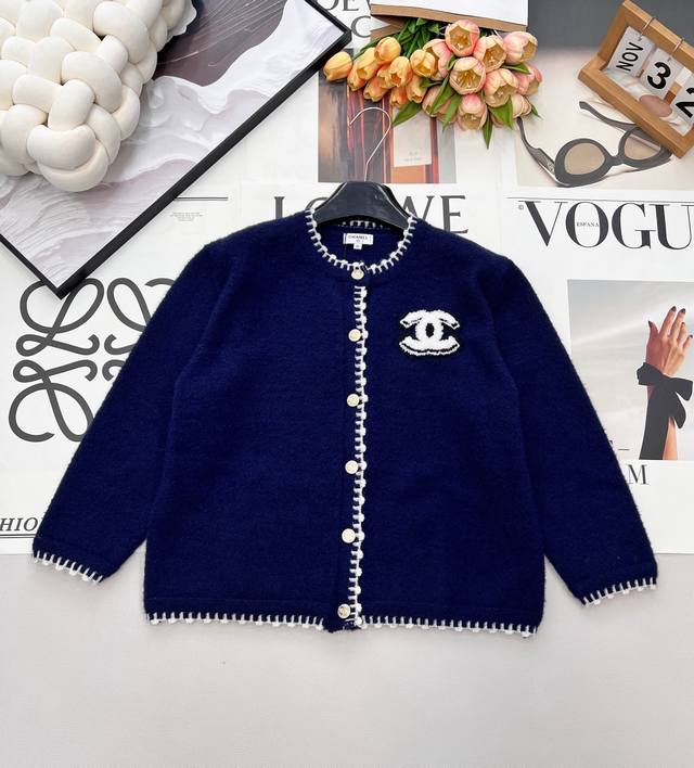 Chanel 2026 New Navy Blue Knit Cardigan. The navy blue base perfectly complement