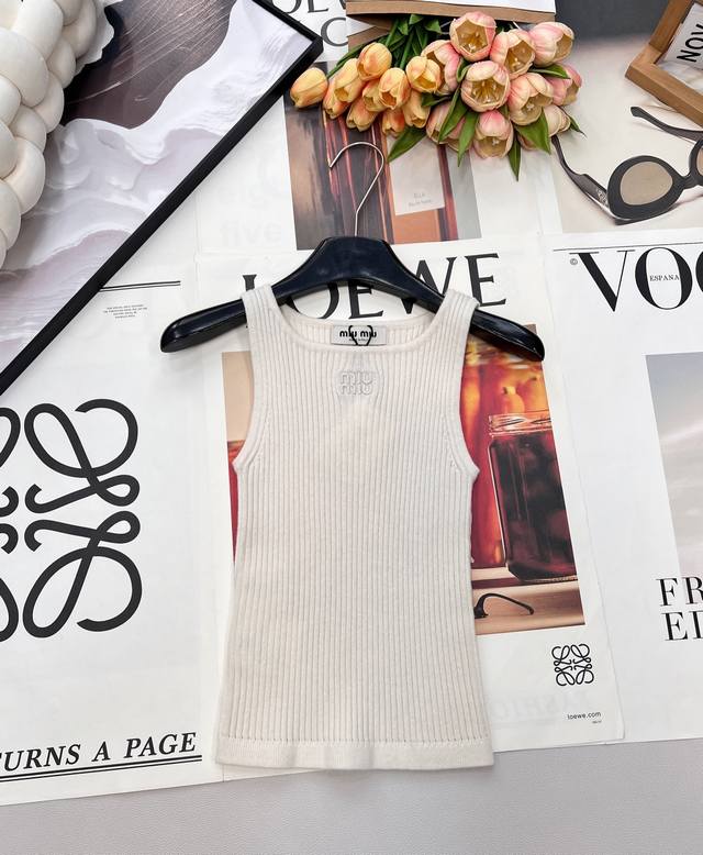 Miumiu Embroidered Logo Ribbed Knit Vest, made with custom wool yarn. This basic