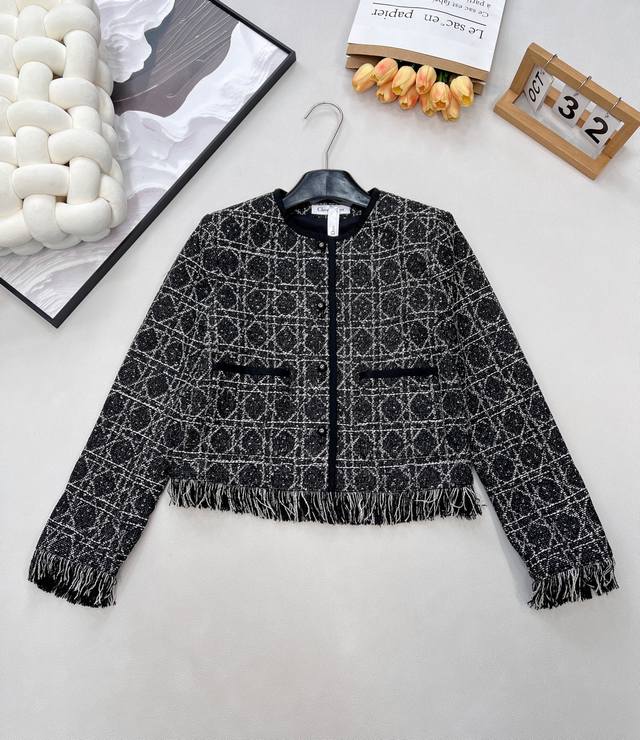 Dior's new Tengger fringed coat is a fantastical fusion of classic and modern s