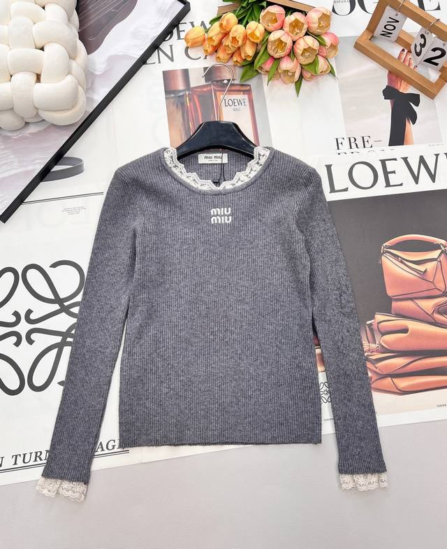 New Miu Miu letter embroidered lace-trimmed knit top. This Miu Miu knit top, co