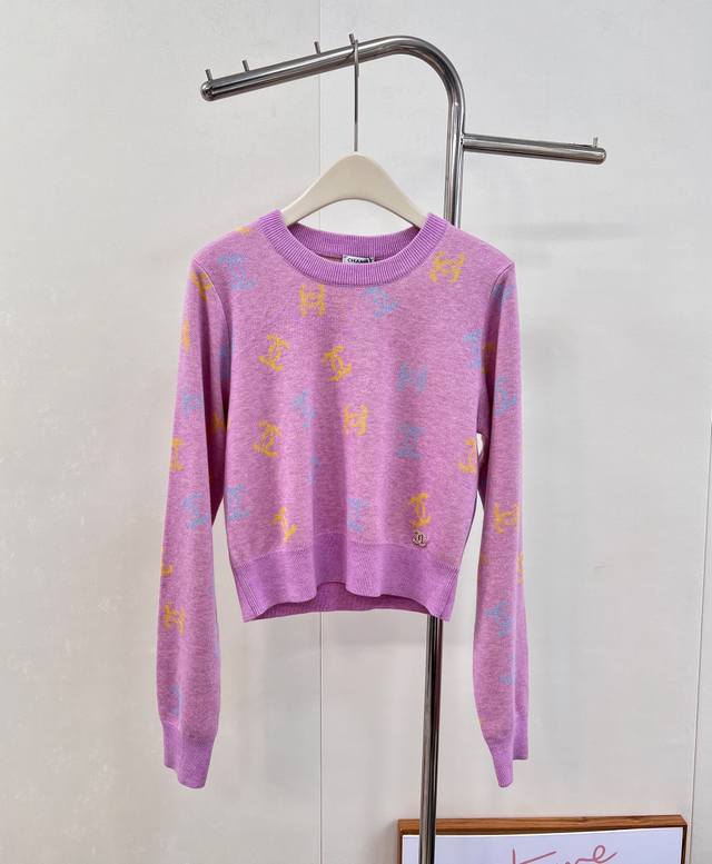 Chanel all-over logo color-blocked pullover sweater. A must-have for cute girls!
