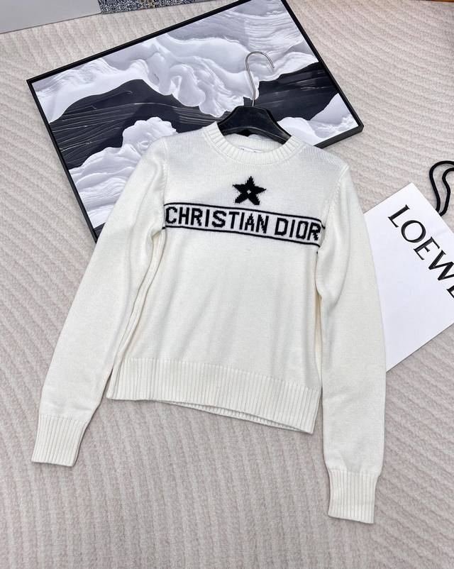 Dior Lucky Five-Pointed Star Short-Sleeve Knit Top. Just looking at it, you can